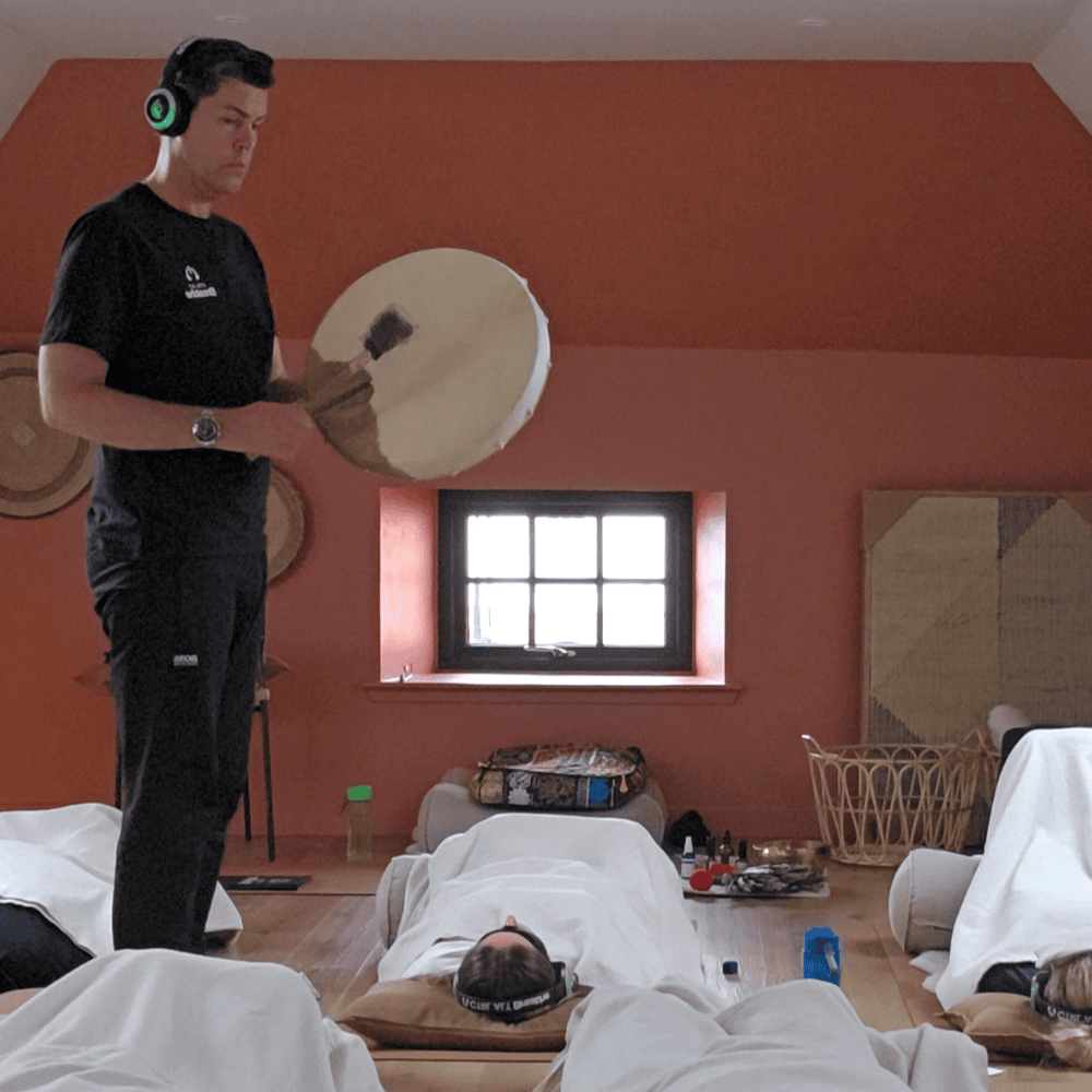 Bryden holding a breathwork session
