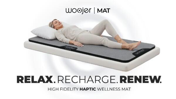 Woojer haptic relaxation mat used for optional private sound vibration support